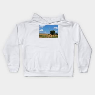 Kansas Windmill with Hay Bales and sky. Kids Hoodie